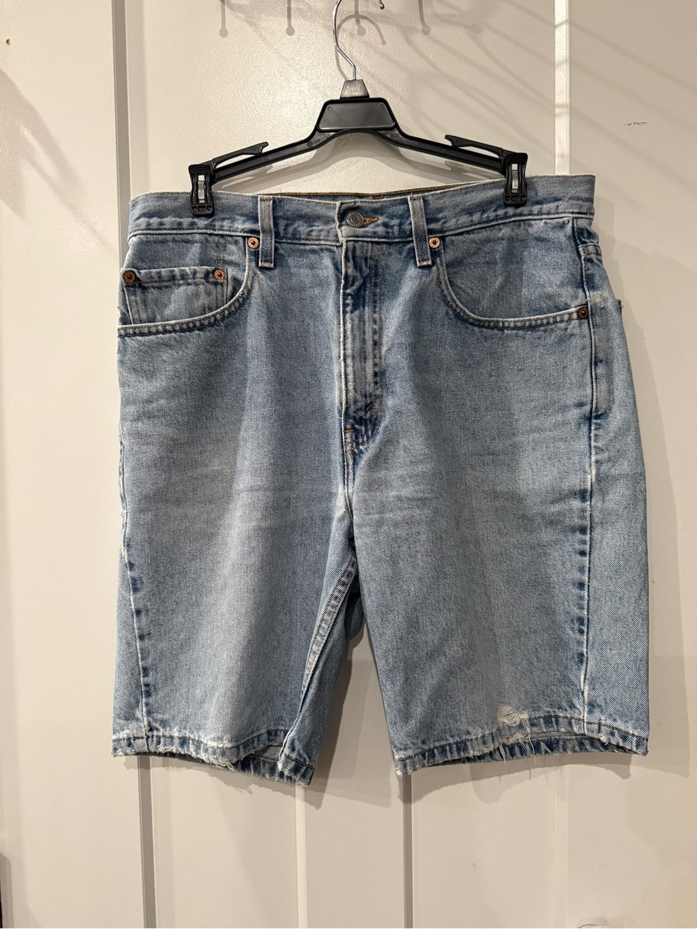 Levi's Light Blue Denim Shorts with Subtle Distressing